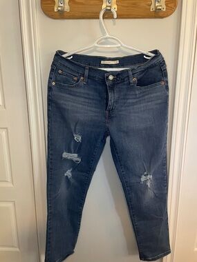 Dark Wash Levi’s boyfriend cut mid rise Distressed Women's Jeans